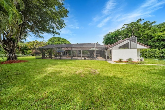 7706 SW 74th Ln, Miami, FL 33143 - view of yard featuring a lanai