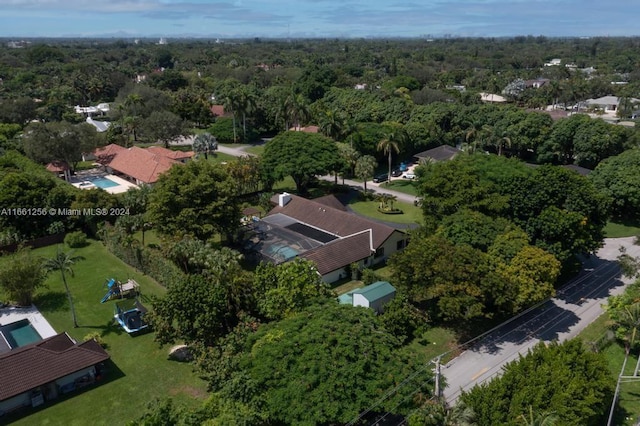 7706 SW 74th Ln, Miami, FL 33143 - bird's eye view featuring a wooded view