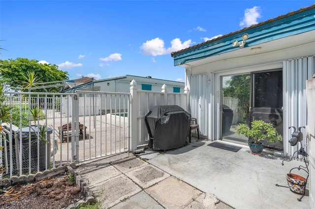 view of patio with a grill