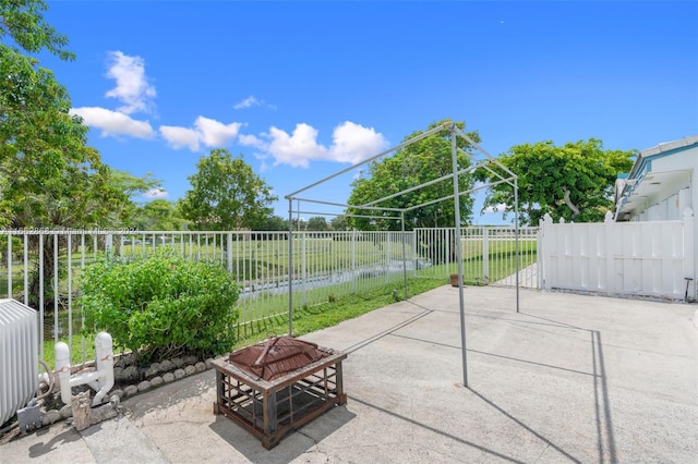 view of patio / terrace featuring a fire pit