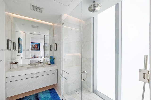 bathroom featuring an enclosed shower, hardwood / wood-style flooring, and vanity