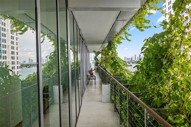 balcony featuring a water view