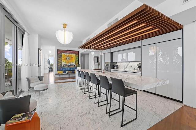 dining room with light hardwood / wood-style flooring