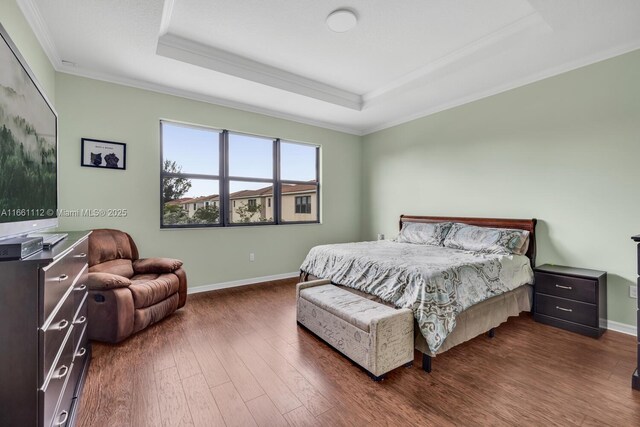 living room featuring crown molding and hardwood / wood-style floors