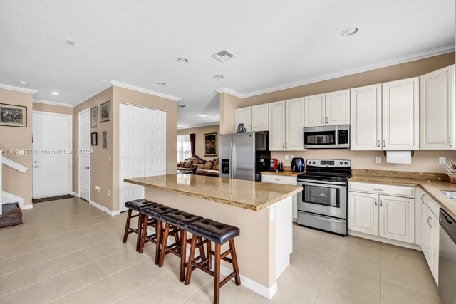 living room with dark hardwood / wood-style floors and ornamental molding