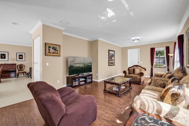 living room with crown molding and hardwood / wood-style flooring