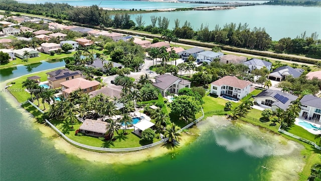 drone / aerial view with a water view