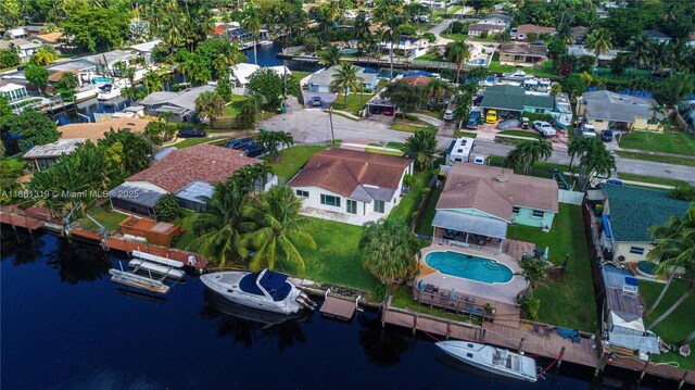 birds eye view of property featuring a water view