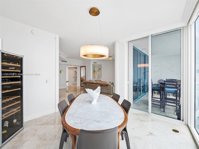 dining area featuring crown molding