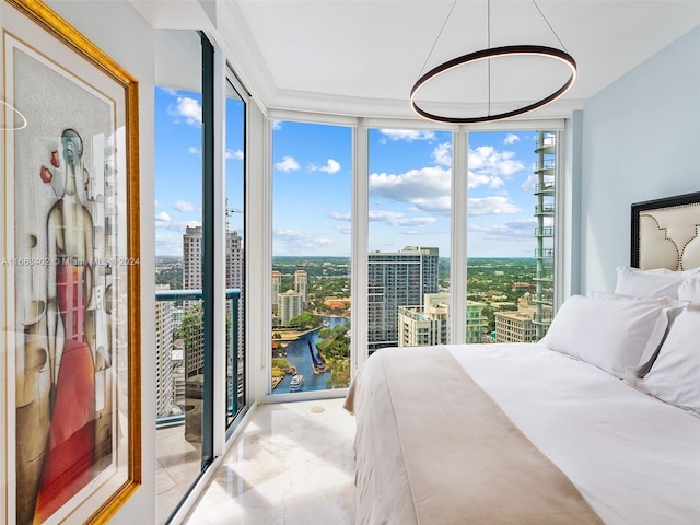 bedroom featuring floor to ceiling windows