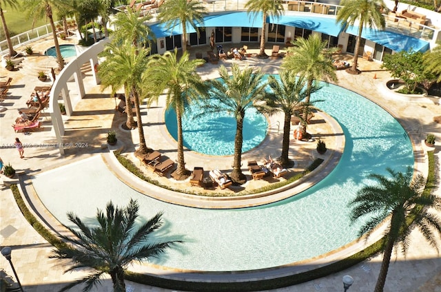 view of pool featuring a patio area