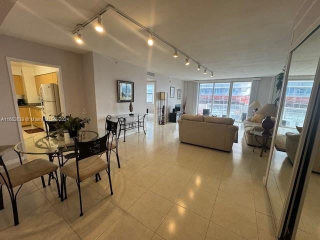 dining room featuring track lighting