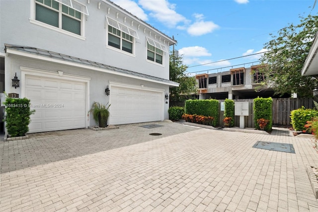 exterior space with a garage