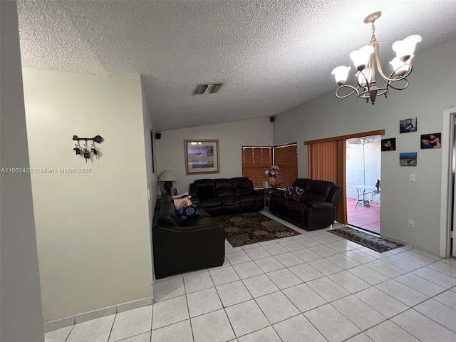 15235 SW 64th Ter Unit 9-35, Miami, FL 33193 - living area with light tile patterned floors, visible vents, a notable chandelier, and vaulted ceiling