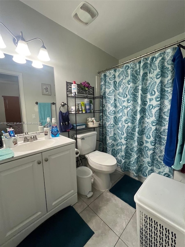 15235 SW 64th Ter Unit 9-35, Miami, FL 33193 - full bathroom with vanity, visible vents, tile patterned flooring, curtained shower, and toilet