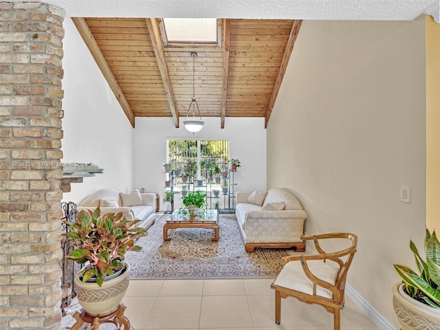 tiled living room featuring vaulted ceiling with skylight and wooden ceiling