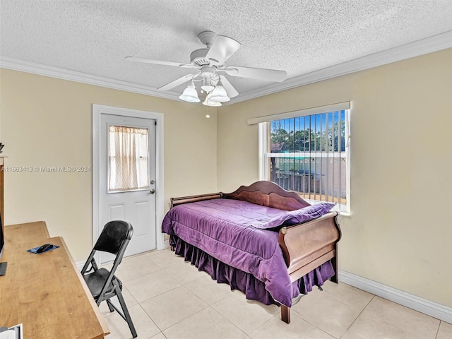 bedroom with a textured ceiling, ceiling fan, light tile patterned flooring, and crown molding