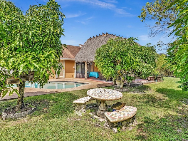 exterior space with a yard and a patio