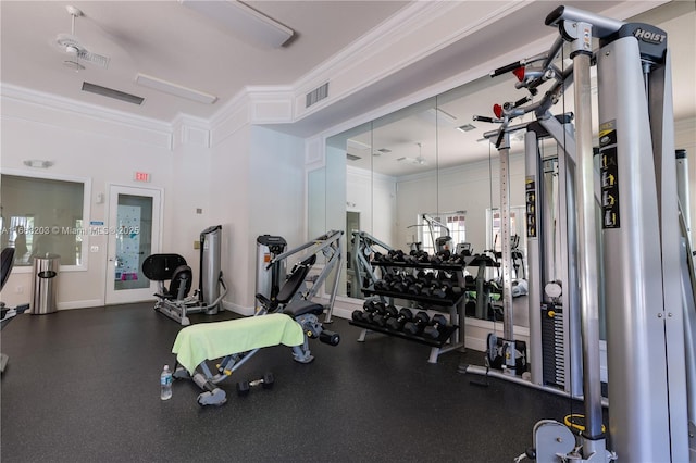 exercise room with ornamental molding