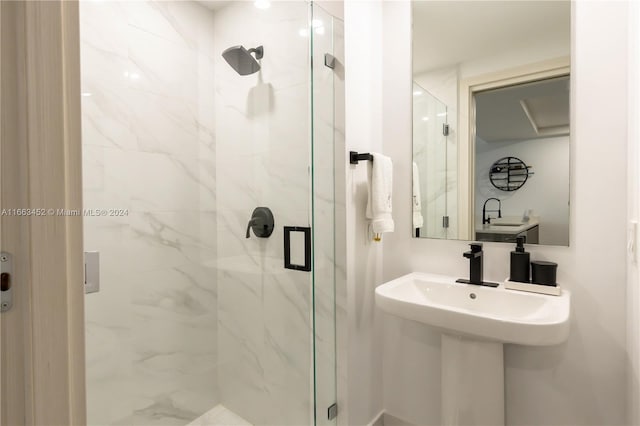 bathroom with an enclosed shower