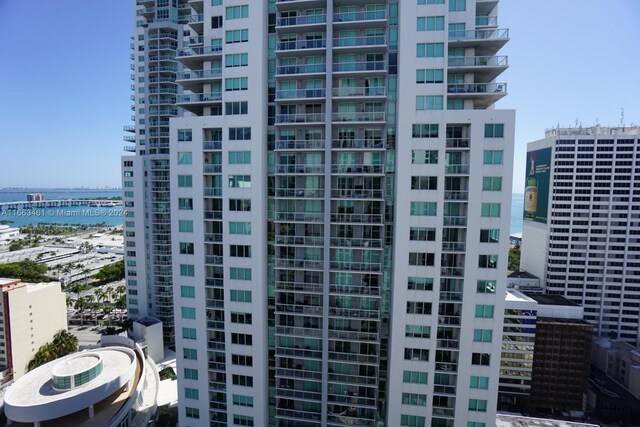 view of building exterior with a water view