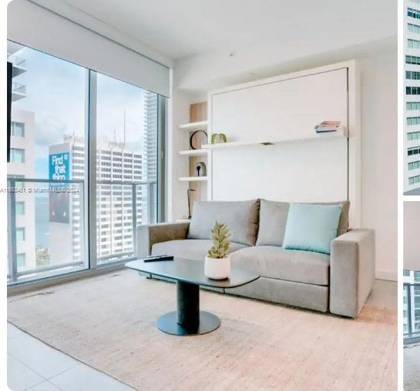 living room featuring light tile patterned floors