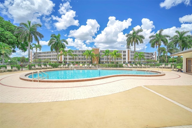 view of swimming pool featuring a patio