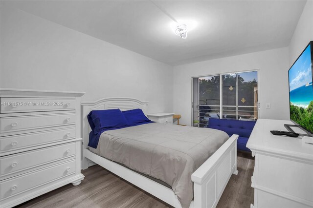 bedroom featuring hardwood / wood-style floors