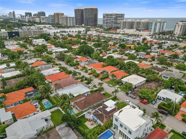 birds eye view of property with a city view