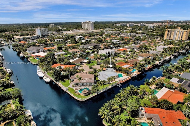 bird's eye view with a water view