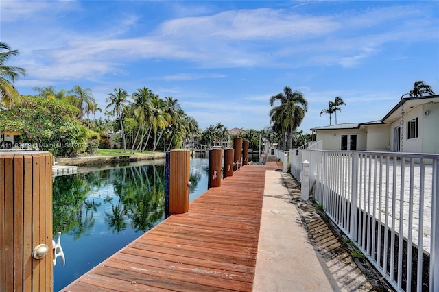 dock area with a water view