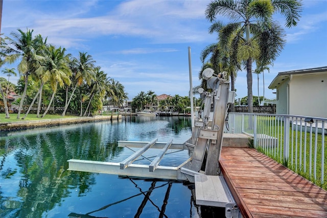 dock area with a water view