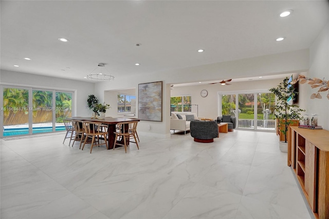 dining space with ceiling fan