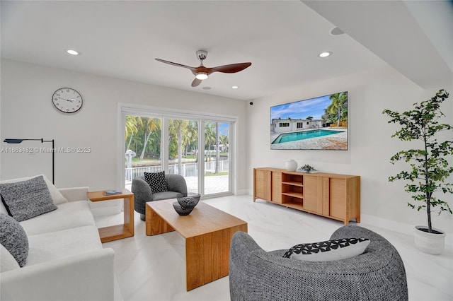 living room featuring ceiling fan