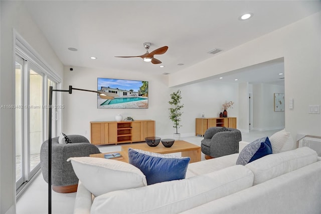 living room with ceiling fan