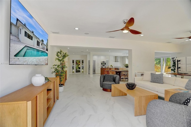 living room with ceiling fan