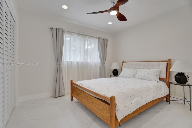 bedroom featuring ceiling fan