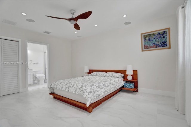 bedroom with ceiling fan and ensuite bathroom