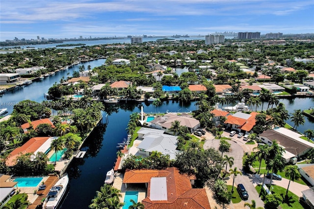 bird's eye view with a water view