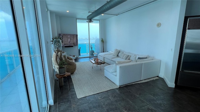 unfurnished living room with expansive windows