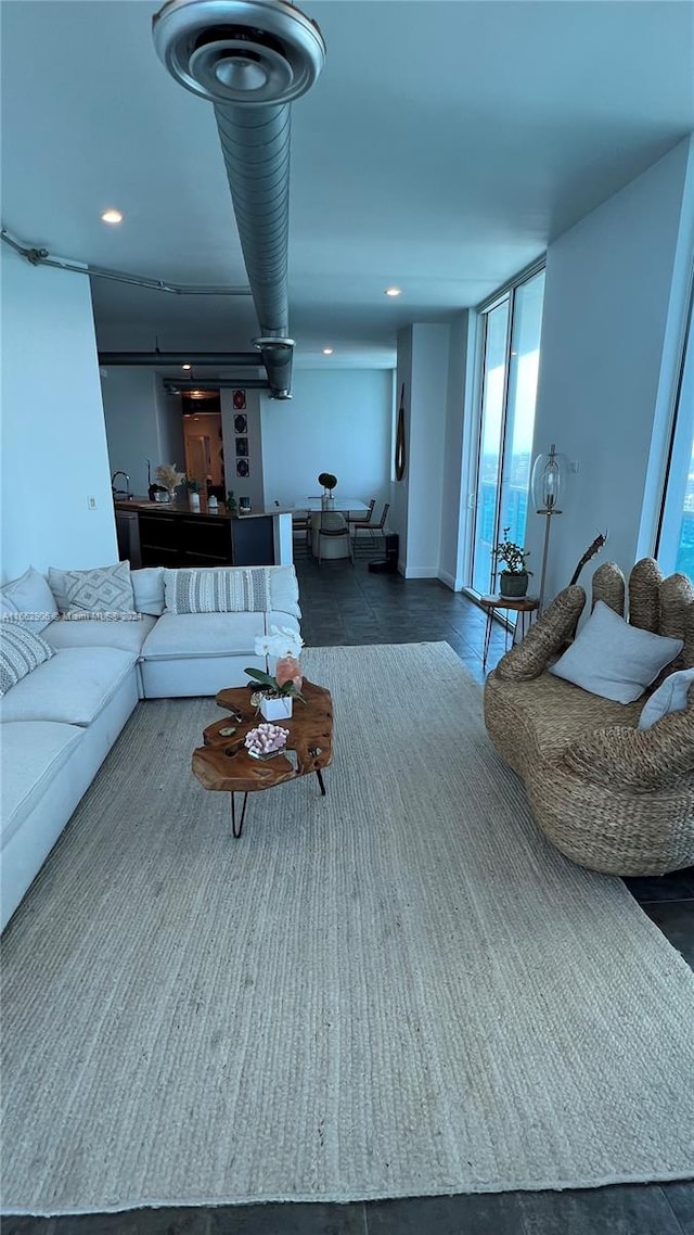 living room featuring a wealth of natural light