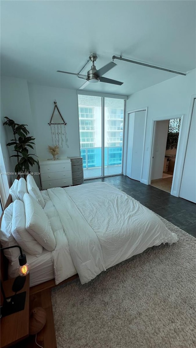 bedroom featuring ceiling fan and access to exterior