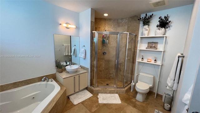 full bathroom with shower with separate bathtub, tile patterned flooring, vanity, and toilet