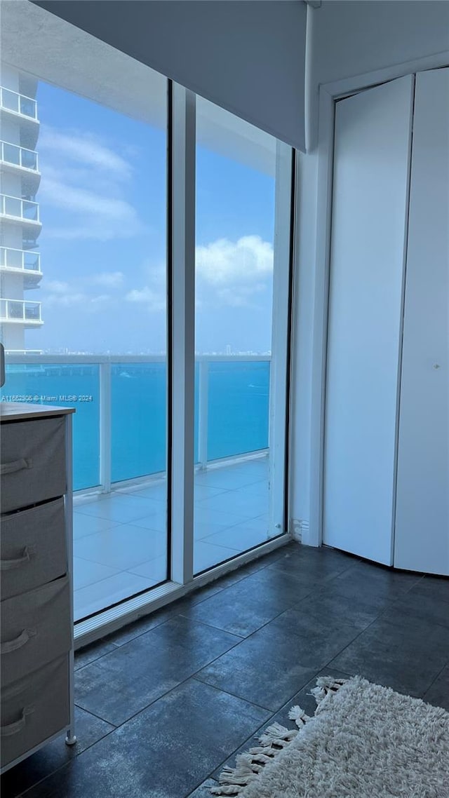 entryway featuring a water view