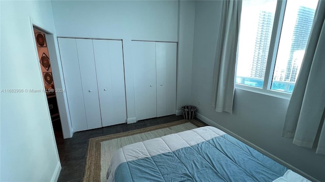 bedroom with two closets