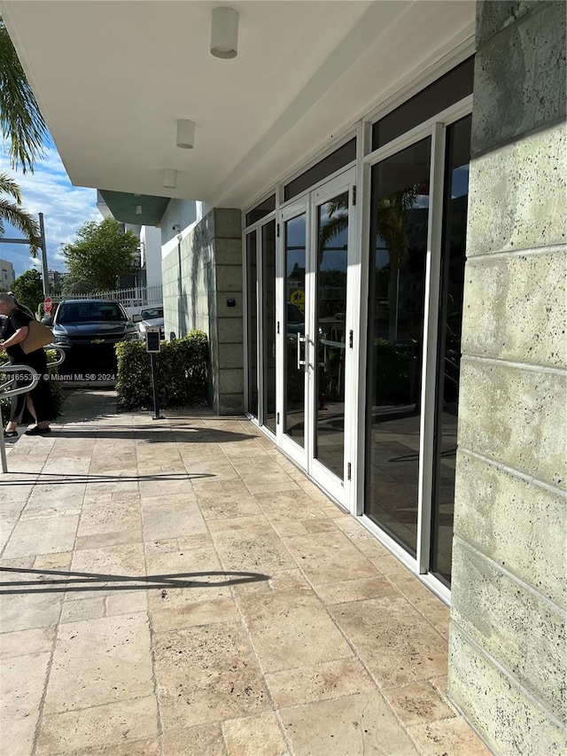 view of patio featuring french doors