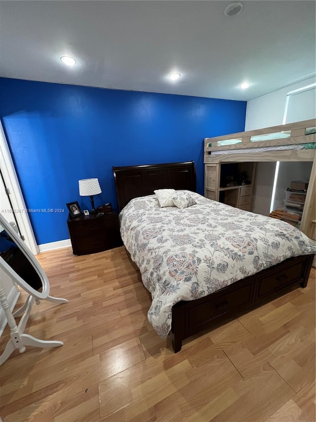 bedroom featuring light hardwood / wood-style floors