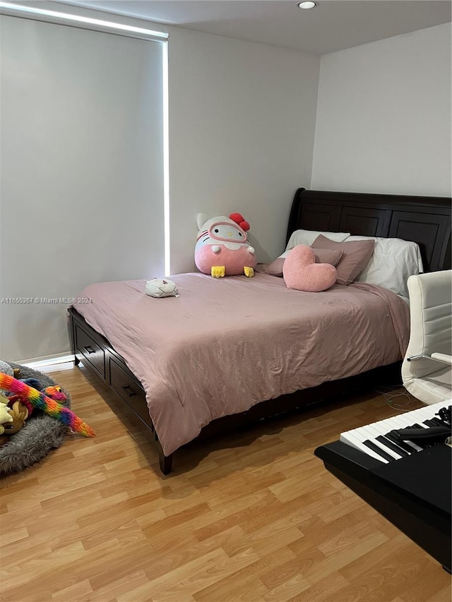 bedroom featuring light hardwood / wood-style floors