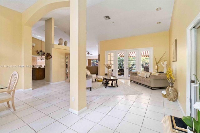 interior space with french doors and a high ceiling