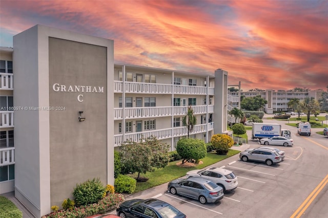 view of outdoor building at dusk